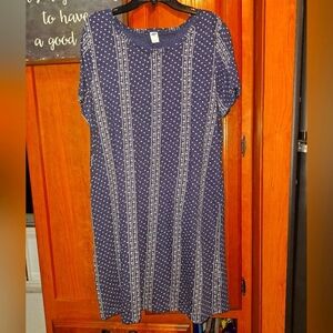 An Old Navy blue sheath dress with a white floral pattern in a size large.